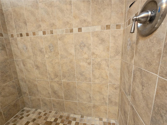 details featuring a tile shower