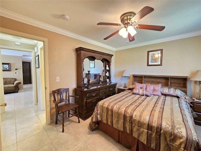 bedroom featuring crown molding, light tile patterned floors, and a ceiling fan