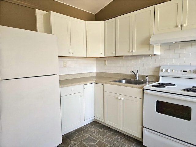 kitchen with under cabinet range hood, backsplash, white appliances, and a sink