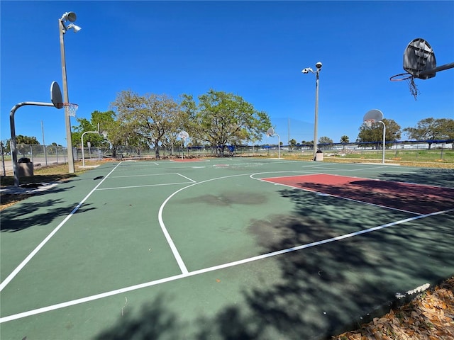 view of sport court with community basketball court and fence