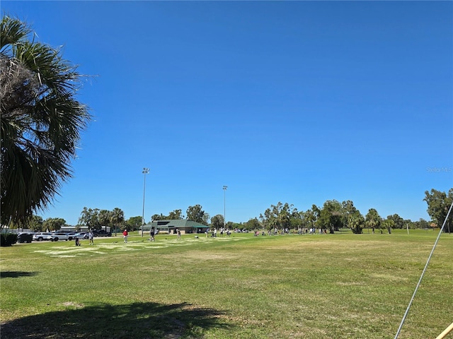 surrounding community with a lawn