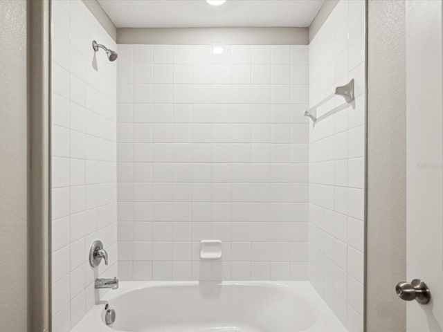 full bath featuring bathing tub / shower combination