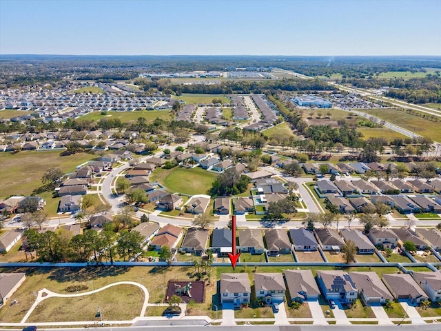 drone / aerial view with a residential view