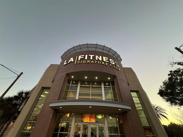 view of property at dusk