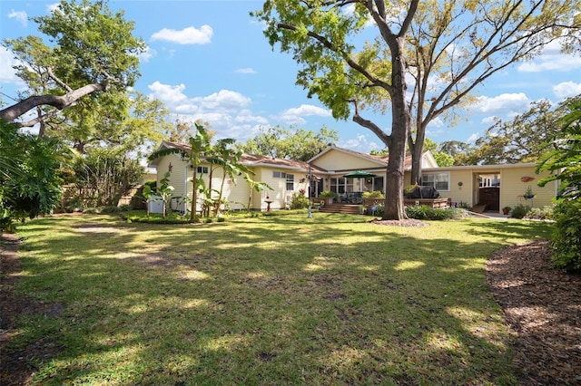 view of yard featuring a wooden deck