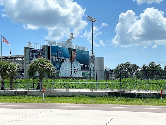 view of property's community featuring fence