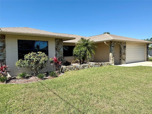 single story home featuring a front yard, an attached garage, driveway, and stucco siding