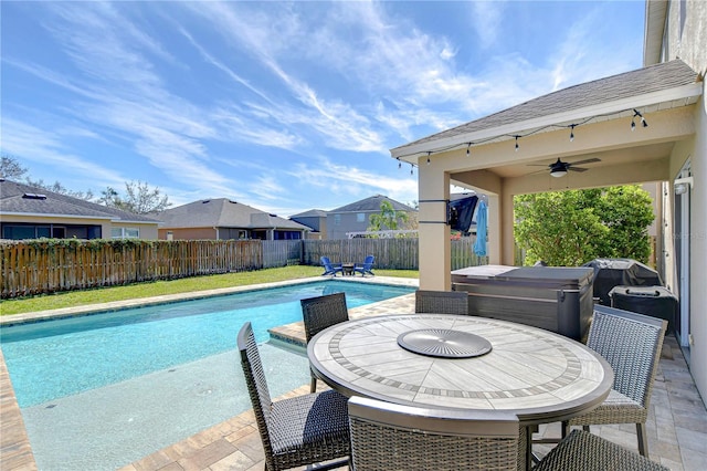 view of pool featuring a fenced in pool, outdoor dining area, a fenced backyard, ceiling fan, and grilling area