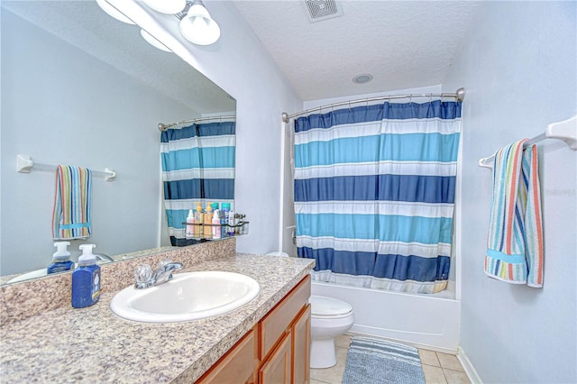 full bathroom with tile patterned flooring, visible vents, vanity, shower / tub combo, and a textured ceiling