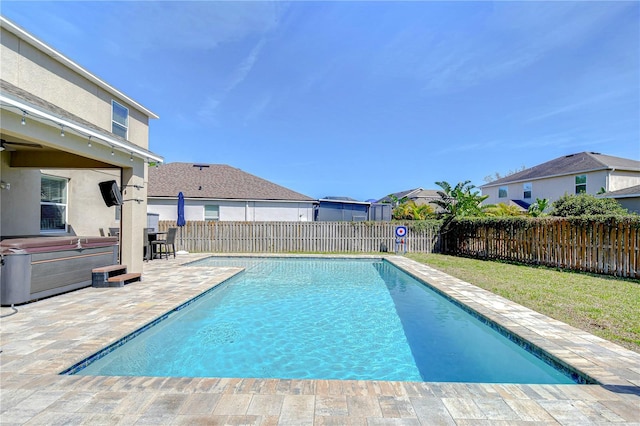 view of pool featuring a residential view, a fenced in pool, a patio, and a fenced backyard