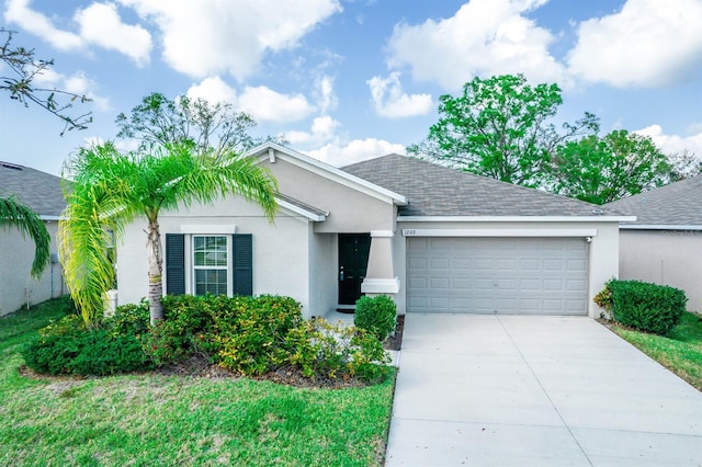 ranch-style home with stucco siding, a garage, roof with shingles, and driveway