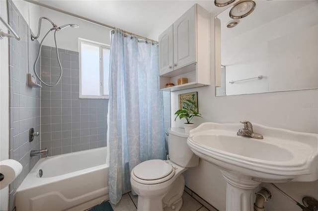 bathroom with tile patterned flooring, shower / bath combination with curtain, and toilet