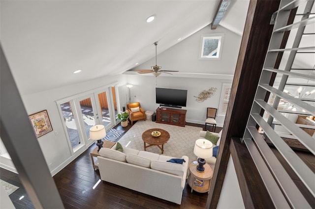 living area with ceiling fan, french doors, dark wood-style flooring, beam ceiling, and baseboards