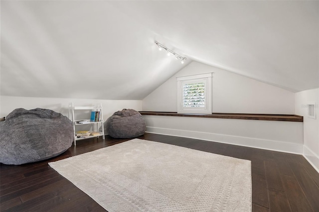 1205 13th St N, Saint Petersburg, FL 33705 - bonus room featuring vaulted ceiling, baseboards, and wood finished floors