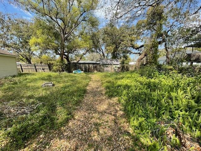 view of yard featuring fence