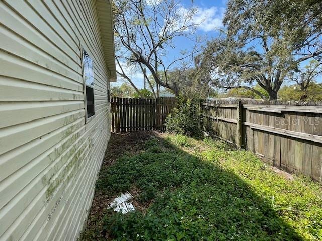 view of yard featuring a fenced backyard