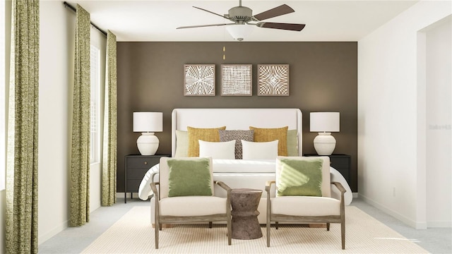 bedroom featuring baseboards, light colored carpet, and a ceiling fan