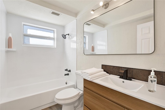 full bathroom featuring visible vents, vanity, toilet, and  shower combination