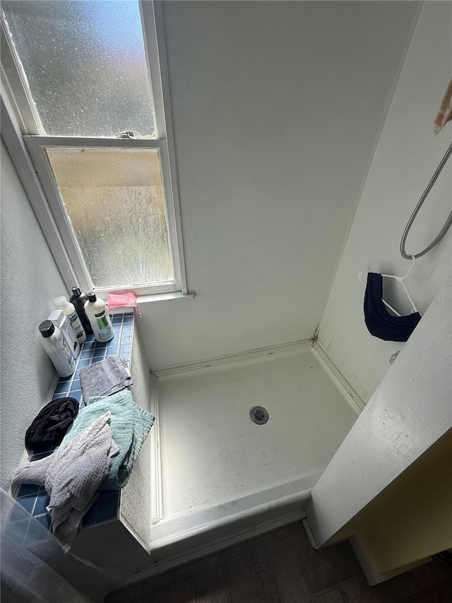 full bath featuring a stall shower