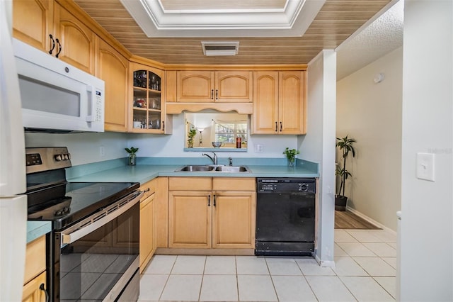 kitchen with white microwave, visible vents, electric range, a sink, and dishwasher