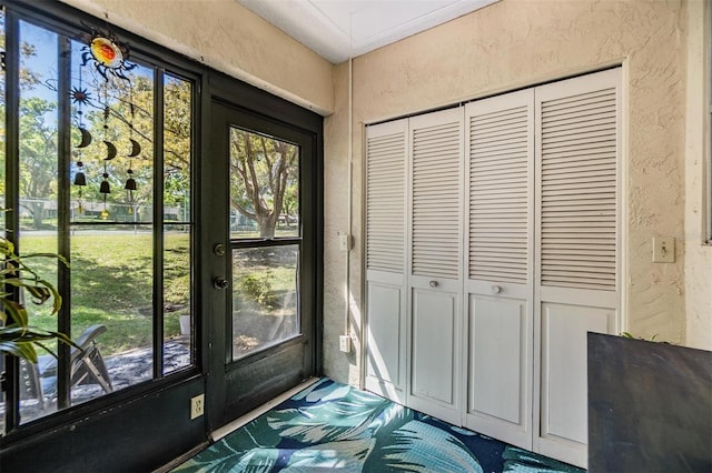 doorway with a textured wall