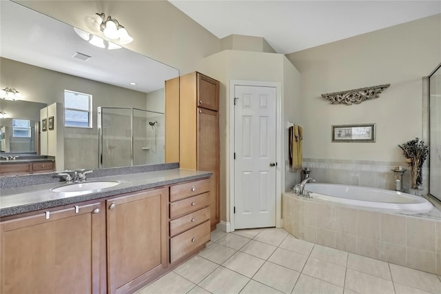 bathroom featuring visible vents, a garden tub, a stall shower, tile patterned floors, and vanity