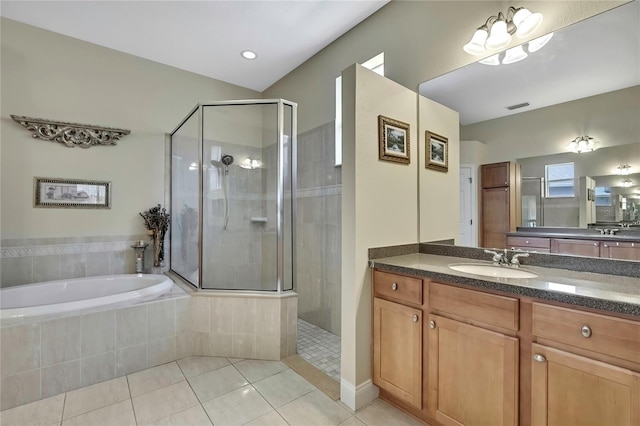 full bathroom featuring vanity, visible vents, tiled shower, tile patterned flooring, and a garden tub