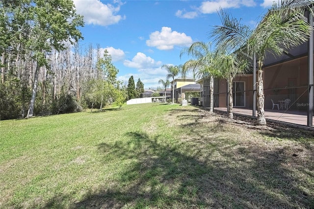 view of yard featuring central AC