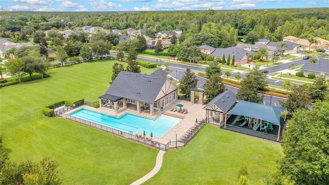 bird's eye view with a residential view and a view of trees