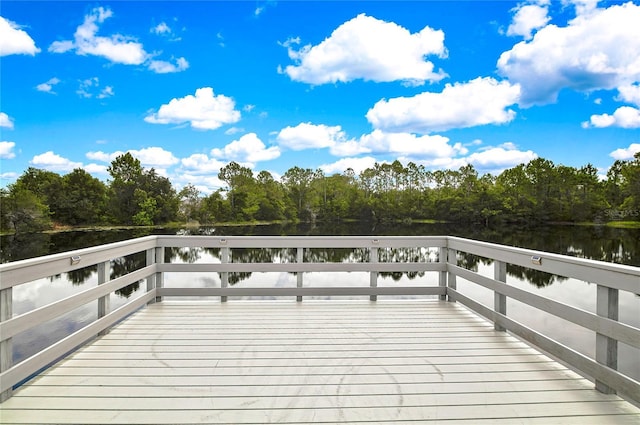 deck featuring a water view