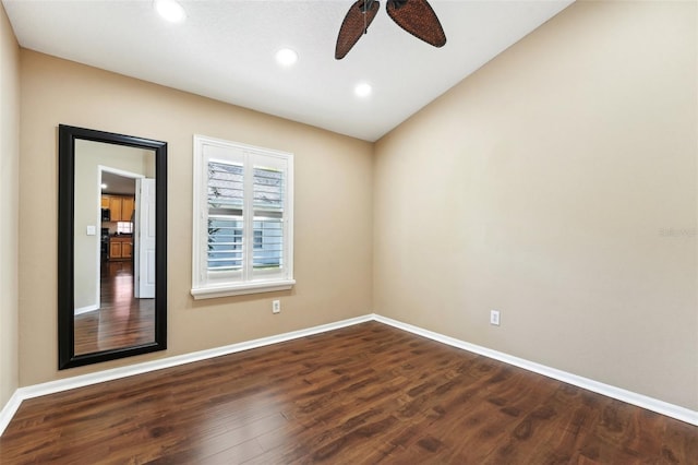 spare room with recessed lighting, dark wood-style floors, baseboards, and ceiling fan