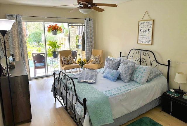bedroom with access to outside, light wood-style flooring, and ceiling fan