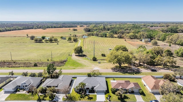 birds eye view of property featuring a residential view and a rural view