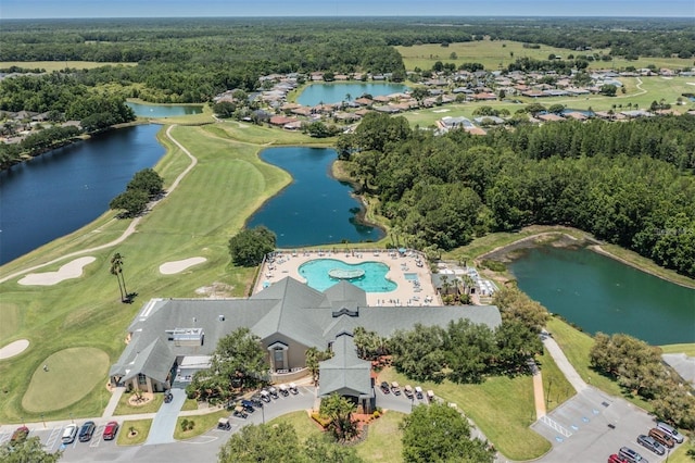 aerial view featuring view of golf course and a water view