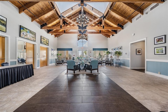 dining area with baseboards, wooden ceiling, and vaulted ceiling with beams