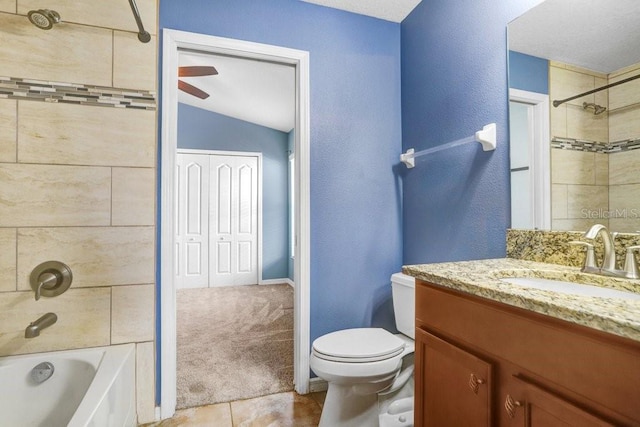 full bathroom featuring vanity,  shower combination, toilet, and tile patterned flooring