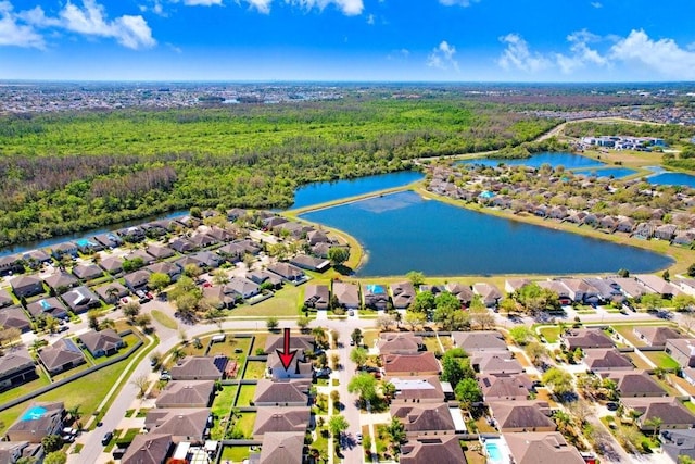 bird's eye view featuring a residential view and a water view