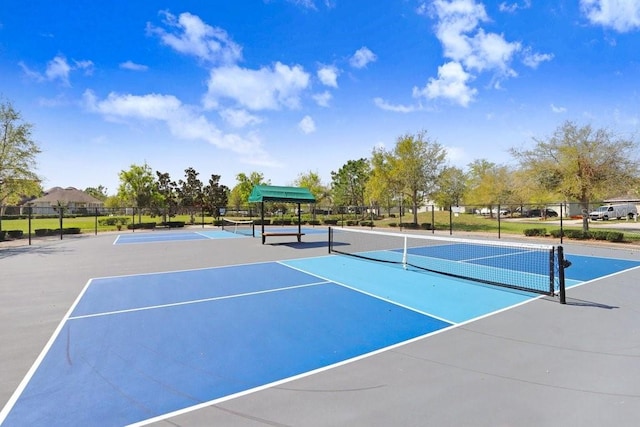 view of sport court featuring community basketball court and fence