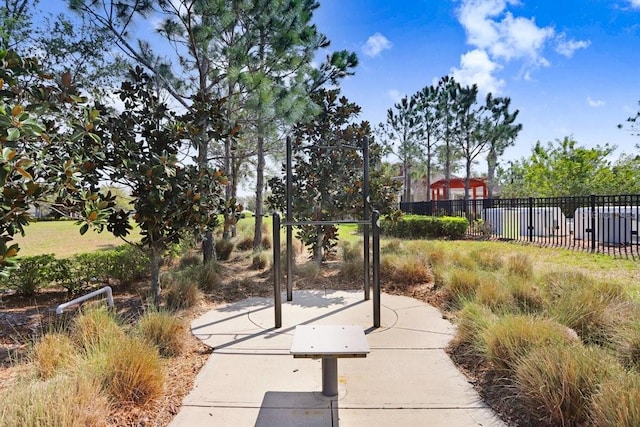 surrounding community featuring fence