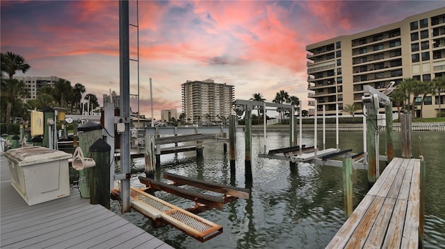 dock area featuring a water view and boat lift