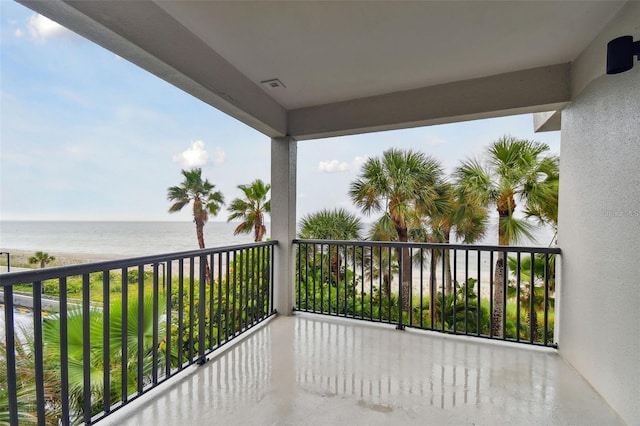 balcony featuring a water view