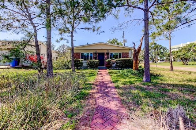 view of front of property with brick siding