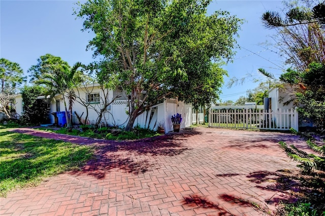 view of patio featuring fence