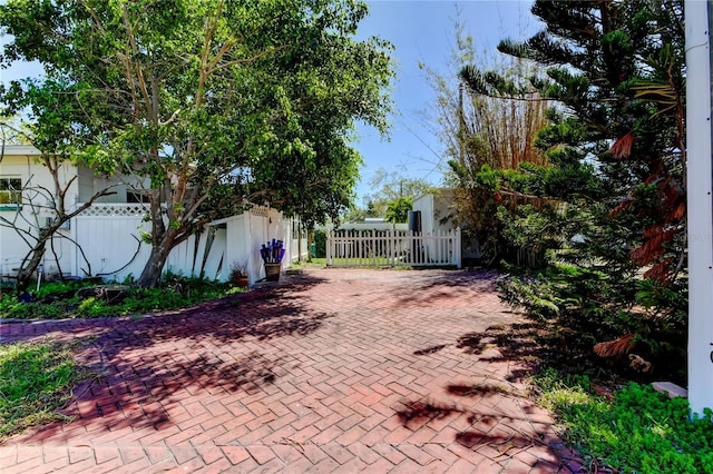 view of patio featuring fence