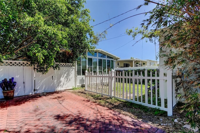 exterior space with a fenced front yard