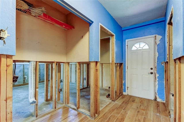 foyer featuring wood finished floors