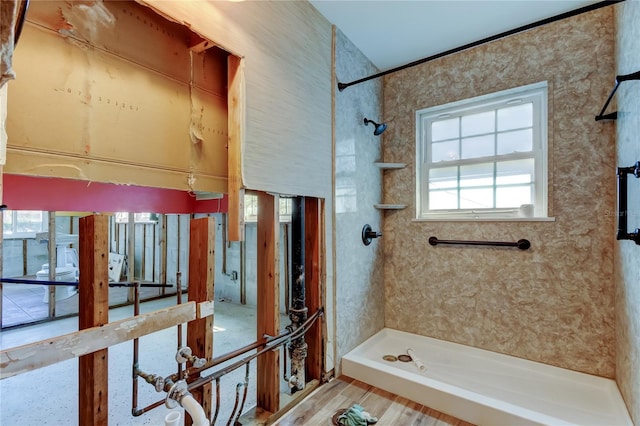 bathroom with a shower stall