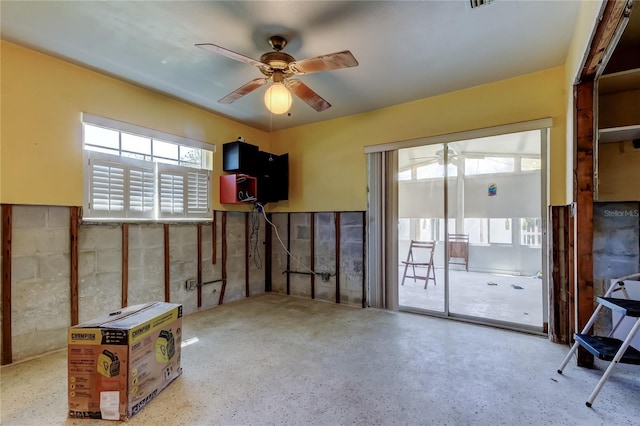 interior space featuring a ceiling fan