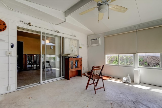 sunroom / solarium with an AC wall unit, lofted ceiling with beams, and a ceiling fan