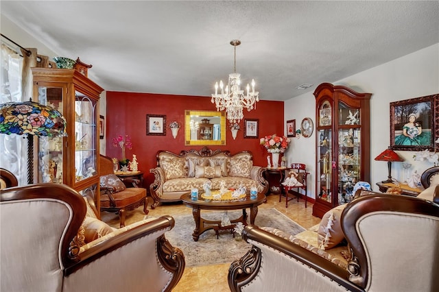 living area with a textured ceiling, visible vents, a wealth of natural light, and a chandelier